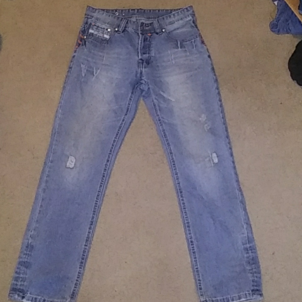 Girls bootcut jeans with small tappered wholes